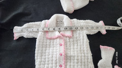 Beautifully handmade, white &pink knitted layette set for an infant 6-9 Mos
