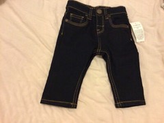 New with label Baby Denim Trousers. 3-6 months. 82% Cotton. Machine wash.