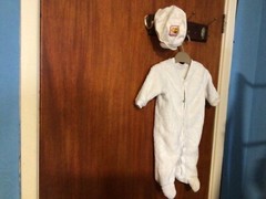 For New Born: white Matalan Baby Grow & Disney Hat. 100% cotton. Machine wash.