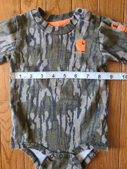 Camouflage Carhartt One piece. 6 Months. Snaps at shoulder and bottom