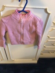 M&S Pink Cardigan Age 1/2 – 2. With zip. 100% Cotton. Machine wash.