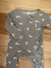 Nordstrom baby romper yellow and white silly goose pattern.