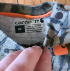 Camouflage Carhartt One piece. 6 Months. Snaps at shoulder and bottom